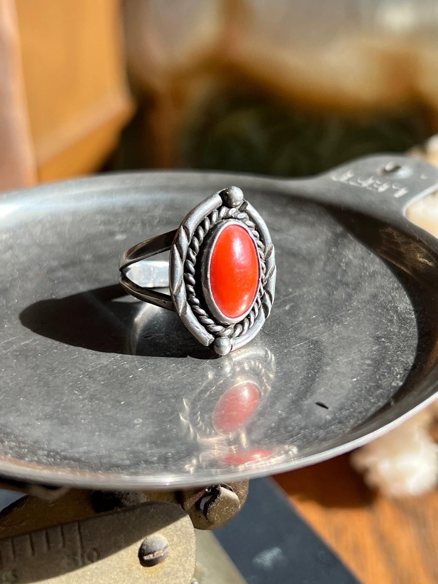 Coral Stone Ring with Braided Frame