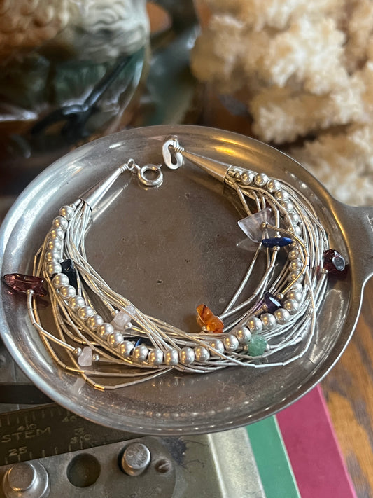 Sterling Silver Strand with Charms Bracelet